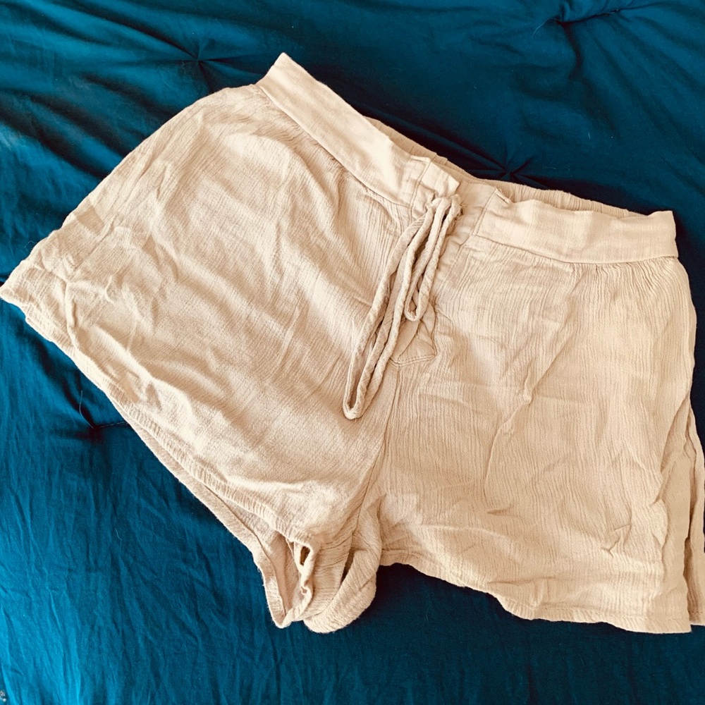 Forever21 tan shorts worn once. Size small. No damage.